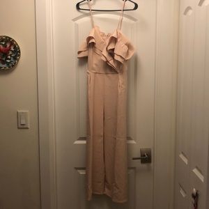 Off shoulder Ruffle jumpsuit. HAS POCKETS